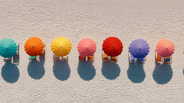 Colorful Umbrellas in a Row on Sandy Beach photo