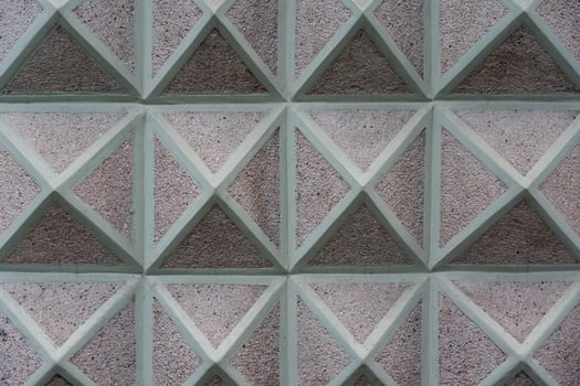 Triangular drawing of the building facade. Pyramid facade. Background triangles photo