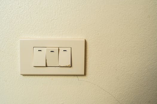 Old white light switch. photo