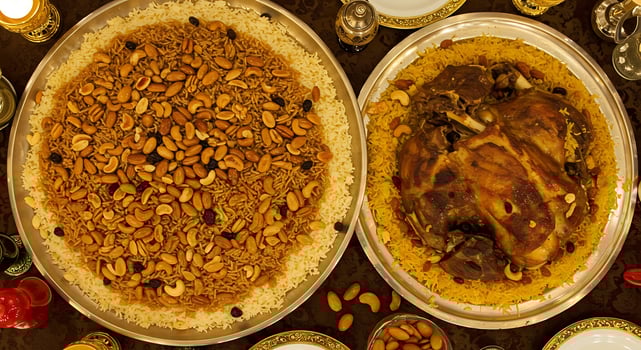 Two plates of food on a table photo