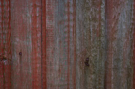 Close-up of old wooden surface with peeling brown paint, rustic weathered texture with vintage and natural details photo