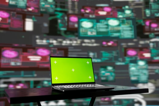 Scene reveals the strategy behind cyber attacks with chroma key on pc, malware and encryption weaknesses are exploited by hackers seeking to gain secure system access. Virtual threat. photo