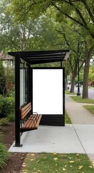 Modern Bus Shelter with Blank Advertisement Panel and Wooden Bench photo