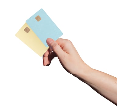 Modern trade payment. Hand holding two plastic bankcards with chip for credit, debit, cashback, photo