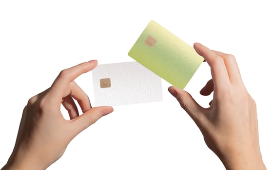 Smart payment offer. Hand holding two plastic bankcards with chip for credit, debit, cashback, photo