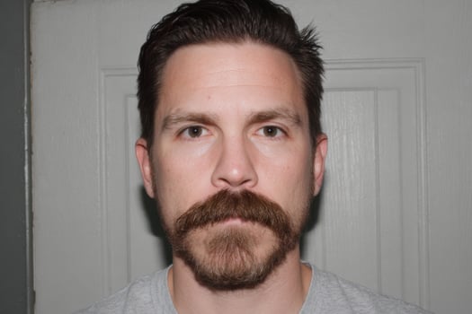Portrait of a Man with a Well Groomed Mustache and Beard photo