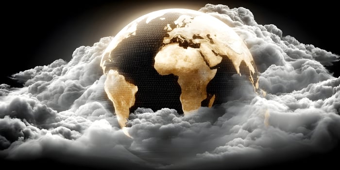 Golden Earth Globe in Clouds Dramatic Lighting Global Theme photo