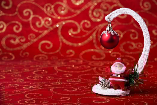 New Year card. Toy Santa Claus. A toy ball for a Christmas tree. Decoration for the holiday. photo