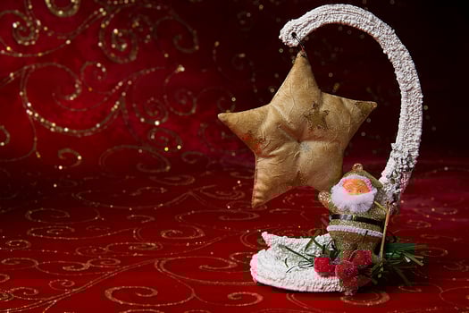 New Year card. Toy Santa Claus. A toy ball for a Christmas tree. photo