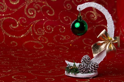 New Year card. Christmas tree toyDecoration for the holiday. Christmas ball and cones photo