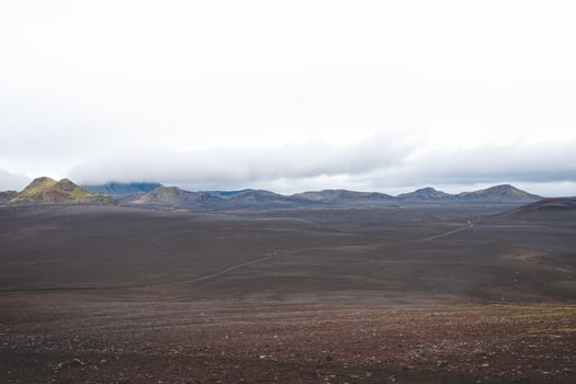plains in Iceland highlands stretch beneath moody skies, evoking a surreal, Mars-like landscape untouched by civilization photo
