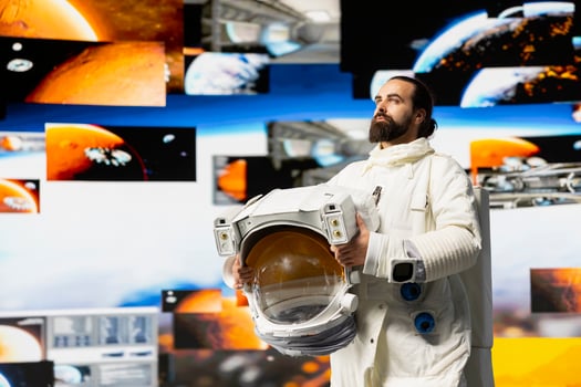 Space man on a cosmic journey mission surrounded by stars and the galaxy, showcasing surreal exploration. Male astronaut with suit and helmet travelling in the universe, outer space adventure. photo