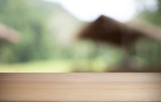 wooden table top blurred background. photo