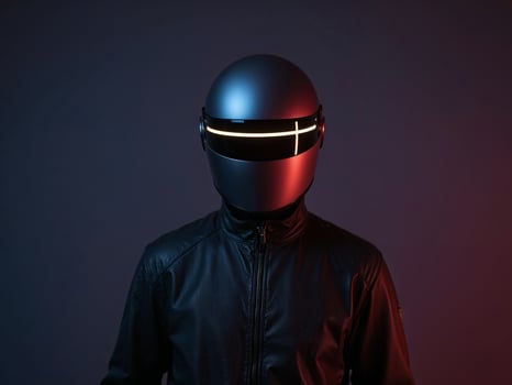 A man wearing a helmet with a glowing light photo