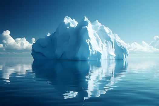 Majestic Iceberg in Tranquil Arctic Waters with Clear Blue Sky photo