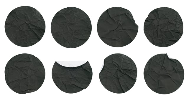 Set collection of blank crumpled black paper stickers in round shape isolated on white background photo