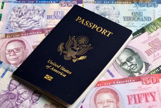 American passport on Liberian dollar photo