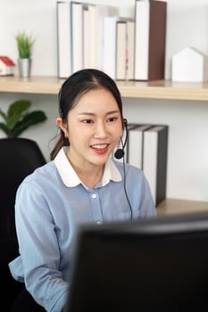 Call Center Employee Providing Customer Support at Home photo