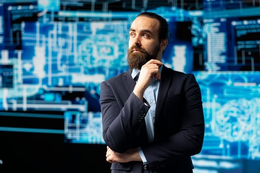 Young businessman studies artificial intelligence neural network on dashboards, using high tech automation tools for coding, analytics and machine learning for strategic development. photo