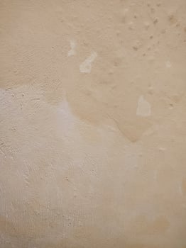 a white wall with a brown stain on it photo