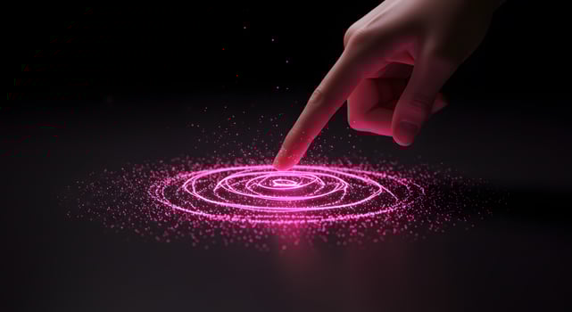 Hand Interacting with Pink Holographic Interface on Black Background photo