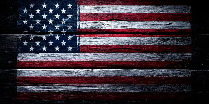 USA Flag Painted on Rustic Wooden Planks Dark Background photo