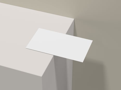 Minimalist business card mockup on edge of light beige table photo