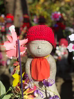 Jizo statues at a temple in Japan, symbol for miscarried children 1 one photo