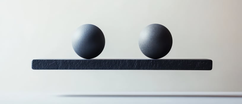Two spheres balanced on a floating platform photo