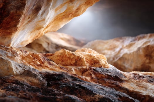 Light filtering through rocks in mysterious cave creating warm atmosphere photo