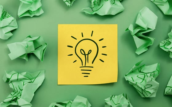 Idea, Innovation and Creativity Concept. a Light Bulb Handdrawn on Sticky Note, New Business photo