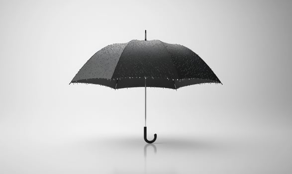 A black umbrella is shown on a white background photo