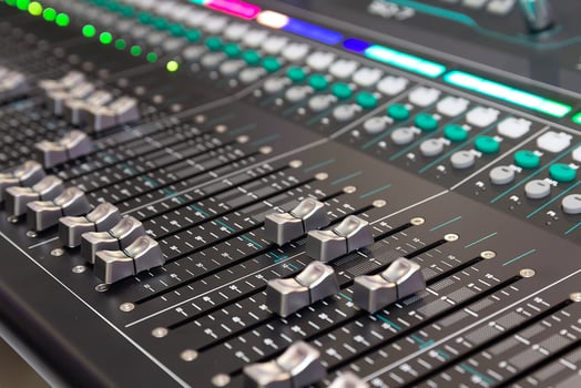 Large professional equalizer in studio. Mixer control panel, sound and music recording industry, photo