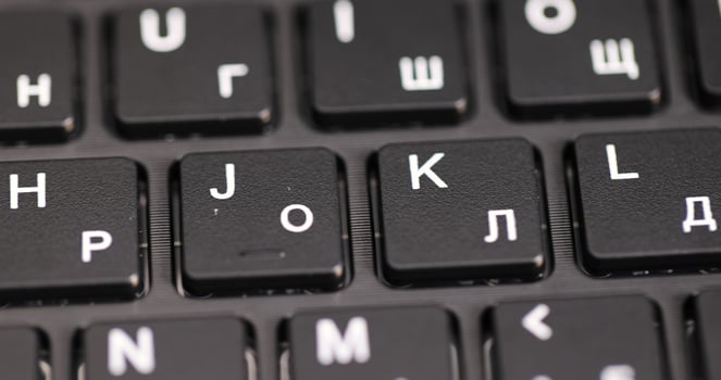 details of the black keyboard in the layout of letters in several languages photo