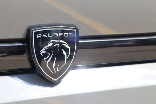 09.3.2025 Moldova A detailed closeup view of the Peugeot logo showcased prominently on a vehicles exterior photo
