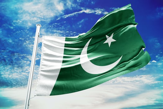 Pakistan flag on a blue sky background photo