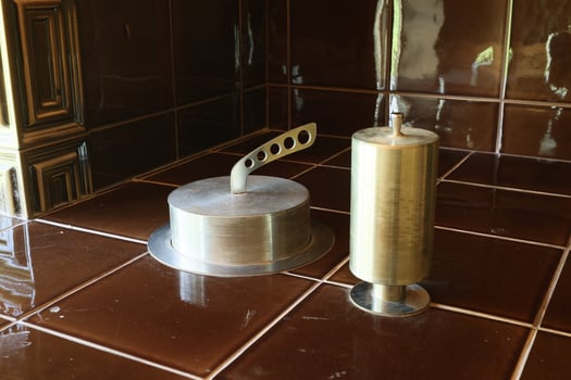 Stylish Kitchen Utensils Displayed on Beautiful Brown Tiles for a Chic Aesthetic Appeal photo