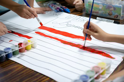 Children, draw on the poster, with pencils and paints photo