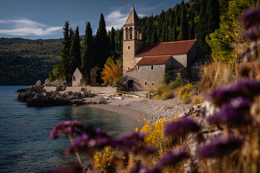 Old Croatian church by the sea surrounded by nature photo