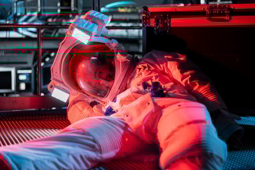 Red light alert blinking over unconscious astronaut losing life in accident onboard space station after sudden system failure. Cosmonaut suffering asphyxiation, having medical emergency photo