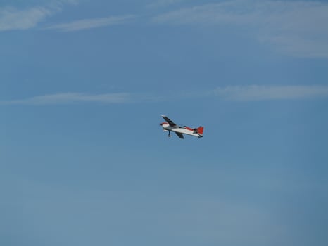 Aerial maneuvering airplane clear sky aviation photography outdoor high angle flight dynamics photo