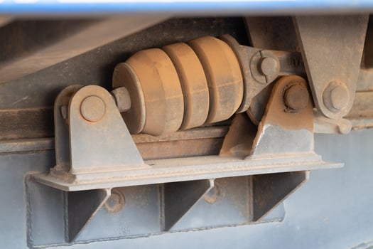Suspension system inspection industrial site mechanical component close-up view engineering concept photo