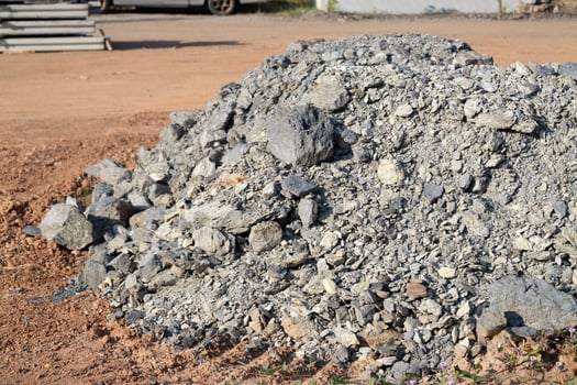 Construction activity gravel pile construction site urban environment ground level industry impact photo
