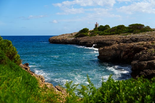 Explore the breathtaking coastal beauty of Mallorca, Spain. Azure waters and rugged cliffs create a stunning view, perfect for travel and tourism in Mallorca, Spain. photo