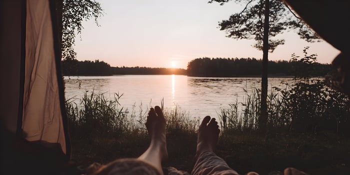 Sunset Lake View from Camping Tent Couple Feet photo