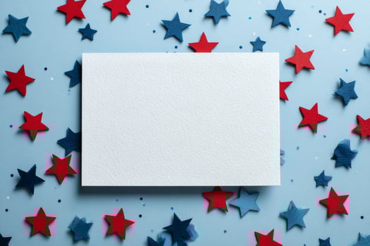 Brightly Colored Stars Surround a Blank Card on a Blue Background for Creative Projects and Celebrations photo
