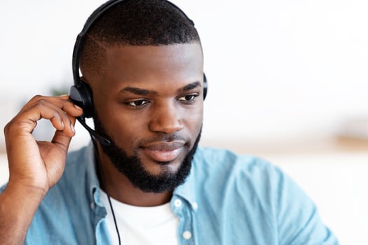 Closeup Portrait Of Handsome Black Male Hotline Operator In Headset, Young African American Customer Support Manager In Headphones Consulting Client, Working At Home Office, Free Space photo
