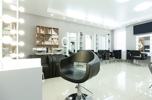 Modern empty hair saloon with chairs and mirrors, free space photo