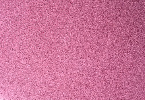 Pink textured surface with rough grain, ideal as a background for creative projects, posters, design templates, or digital graphics with copy space. photo