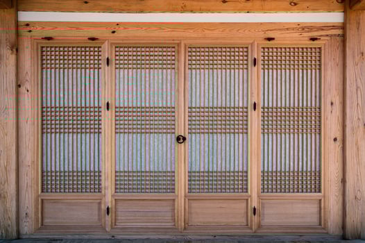 Traditional wooden closed door with paper decoration photo